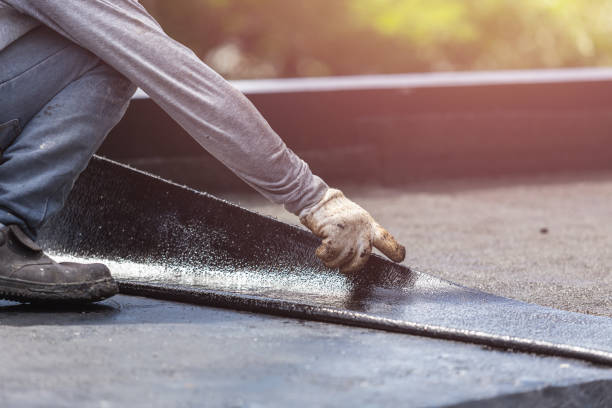 Professional Basement Waterproofing technician working in Burke, VA